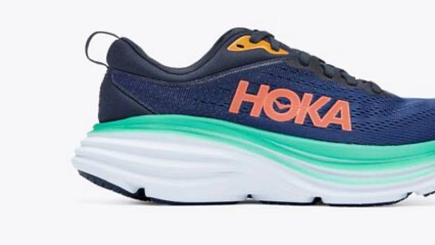 Navy, teal, and orange Hoka shoes.