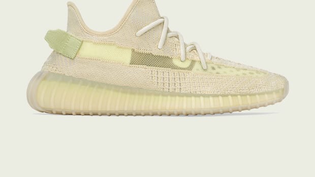 View of yellow Yeezy 350 shoes.