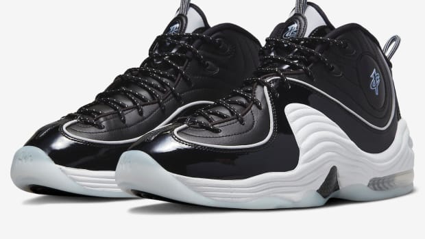 Side view of Penny Hardaway's black and white Nike shoes.