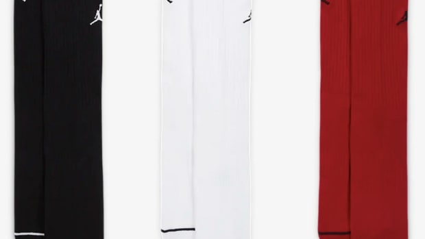 Black, white, and red Jordan Brand crew socks.