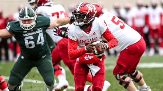 Indiana's Dexter Williams II looks to throw against Michigan State during the third quarter on Saturday, Nov. 19, 2022 at Spartan Stadium in East Lansing.