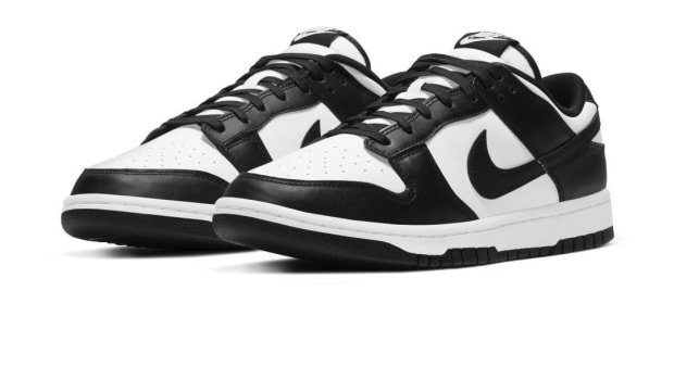 View of black and white Nike Dunk shoes.