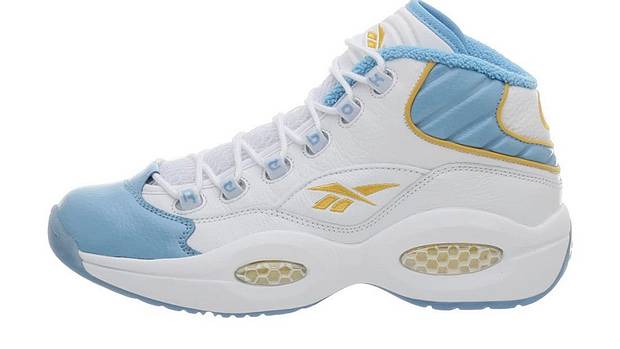 White and blue Reebok shoe.