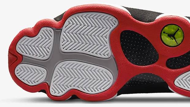 View of white and red Air Jordan shoe outsole.