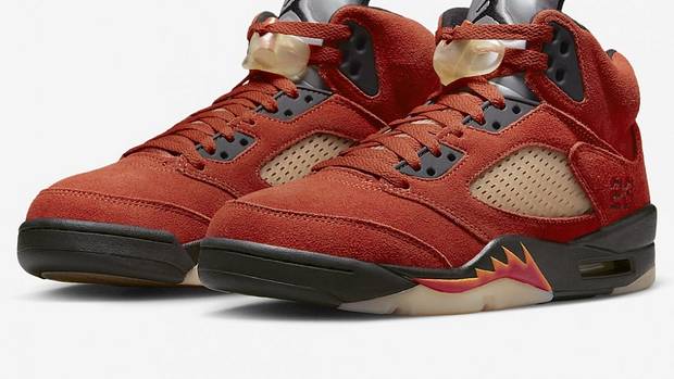 View of red and black Air Jordan shoes.