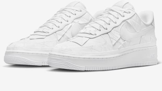 View of white Nike Air Force 1 shoes.