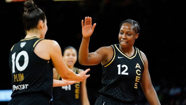 Kelsey Plum of the Las Vegas Aces celebrates during the 2022 WNBA