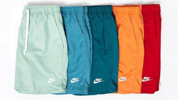 View of green, blue, orange, and red Nike shorts.