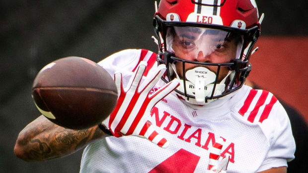 Indiana's DeQuece Carter (4) catches a pass during the first day of fall camp for Indiana football at their practice facilities on Wednesday, Aug. 2, 2023.