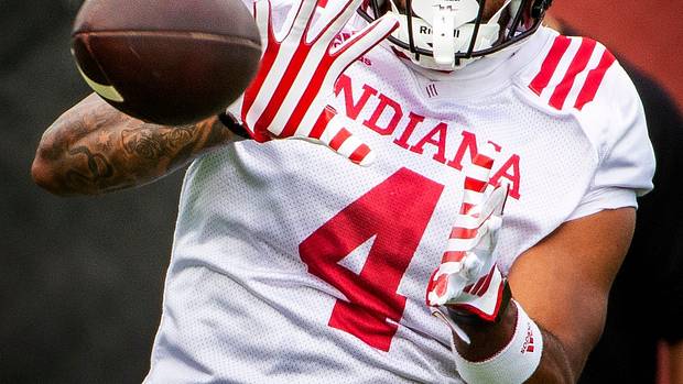 Indiana's DeQuece Carter (4) catches a pass during the first day of fall camp for Indiana football at their practice facilities on Wednesday, Aug. 2, 2023.