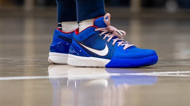 Duke coach Kara Lawson's blue and white Nike Kobe sneakers.