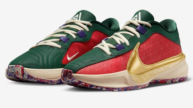 Side view of Giannis Antetokounmpo's green, red, and gold Nike shoes.