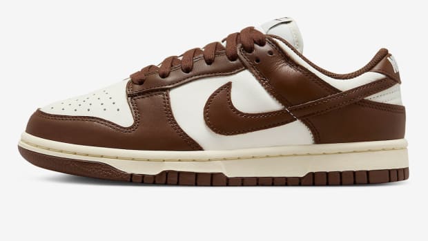 Side view of a brown and white Nike Dunk sneaker.