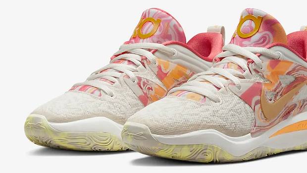 View of pink and orange Nike KD shoes.