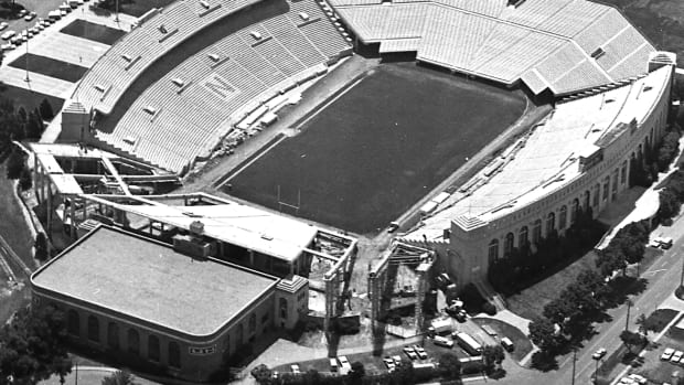 1966 North end zone wings construction Memorial Stadium