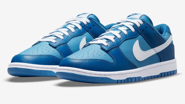 Two-toned blue Nike Dunk shoes.