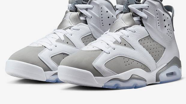 View of white and grey Air Jordan shoes.