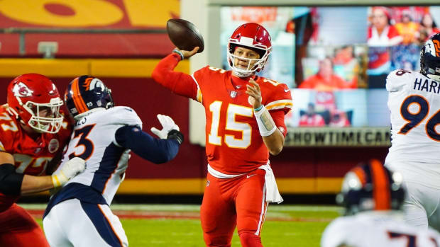 Kansas City Chiefs quarterback Patrick Mahomes (15) throws a pass against the Denver Broncos during the second half at Arrowhead Stadium.