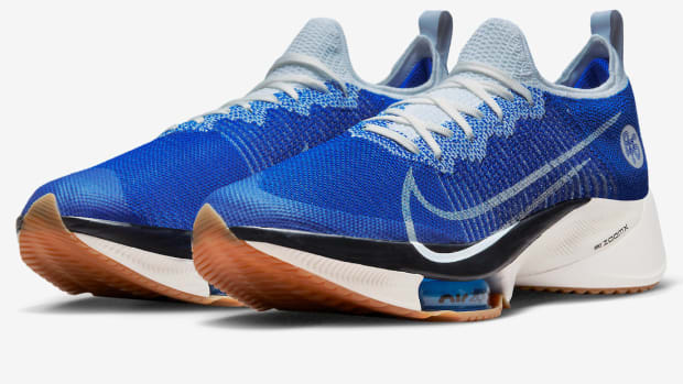 View of blue Nike running shoes.