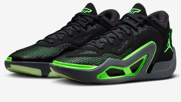 Side view of Jayson Tatum's black and green Jordan Brand sneakers.