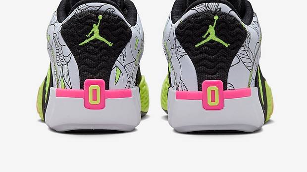Rear view of Jayson Tatum's white, black, and green Jordan Brand sneakers.