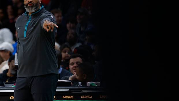 Washington Wizards head coach Wes Unseld Jr. gestures from the bench against the Orlando Magic in the second quarter at Capital One Arena.
