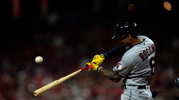 Cleveland Guardians shortstop Brayan Rocchio (6) hits a base hit in the eighth inning of the MLB baseball game between the Cincinnati Reds and the Cleveland Guardians at Great American Ball Park in Cincinnati on Wednesday, Aug. 16, 2023.