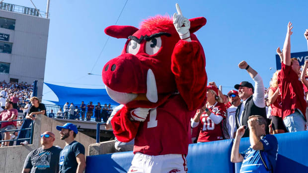 Arkansas mascot celebrates at BYU with Hog fans.