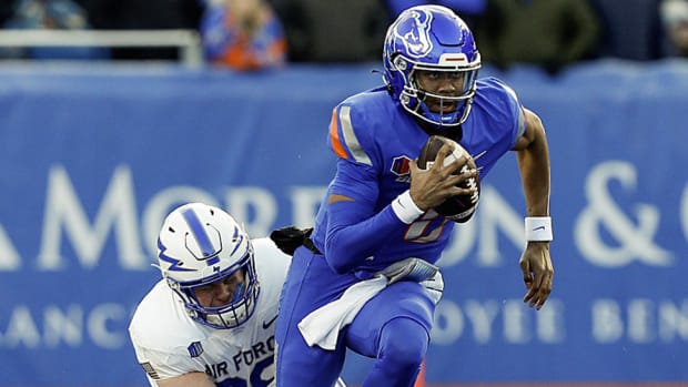 Boise State Broncos quarterback Taylen Green (10) scrambles during the second half against the Air Force Falcons at Albertsons Stadium. Boise State defeats Air Force 27-19.