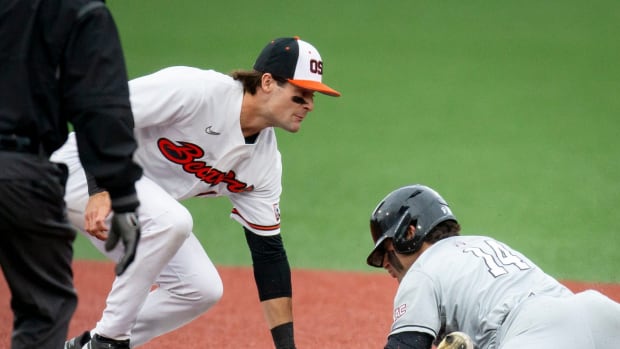 Oregon State short stop Kyle Dernedde tags out New Mexico State center fielder Tommy Tabak at second base during the Beavers 5-4 win over New Mexico State Friday, June 3, 2022, at the 2022 NCAA Corvallis Regional.