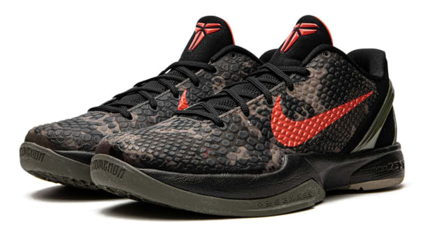 Side view of Kobe Bryant's black and red camo shoes.