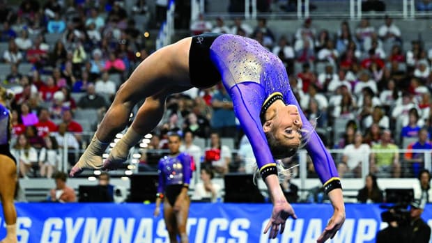 LSU Tigers gymnast Olivia Dunne warms up with her team on floor during the NCAA Women's National Gymnastics Tournament Championship at Dickies Arena.