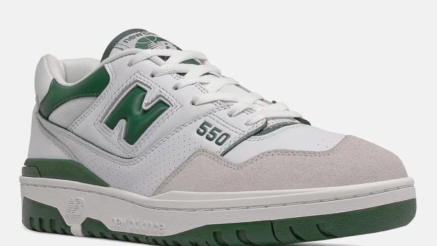 White and green New Balance 550 shoes.