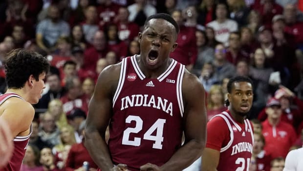 Indiana Hoosiers forward Payton Sparks (24) celebrates his dunk against the Wisconsin Badgers. 
