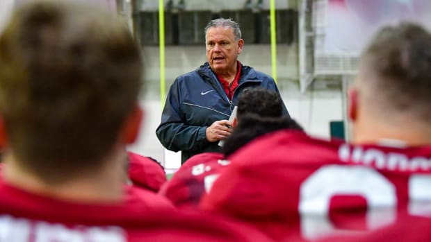 Arkansas head football coach Sam Pittman talks with his Razorback football team during spring practice. The Hogs are looking to improve on last year's 9-win season after rebuilding from the disastrous Chad Morris years.