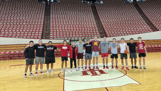 Gophers men's basketball managers with Indiana managers