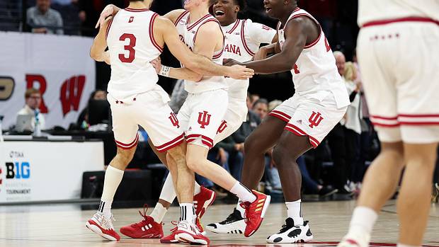 Indiana Hoosiers celebrate a win over the Penn State Nittany Lions at Target Center.