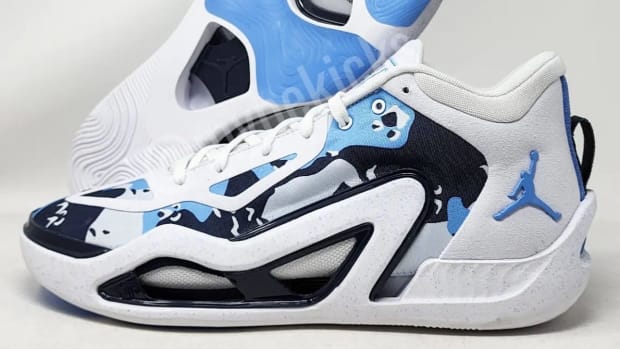 Side view of Jayson Tatum's blue and white Jordan Brand sneakers.