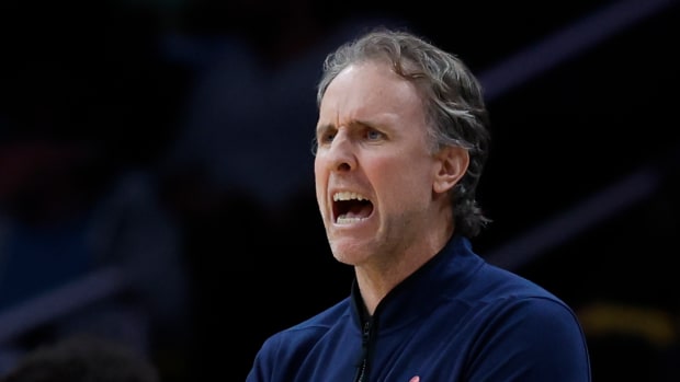 Washington Wizards interim head coach Brian Keefe yells from the bench against the Utah Jazz in the first half at Capital One Arena. 