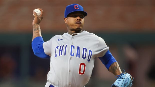 Sep 28, 2023; Atlanta, Georgia, USA; Chicago Cubs starting pitcher Marcus Stroman (0) throws against the Atlanta Braves in the first inning at Truist Park. Mandatory Credit: Brett Davis-USA TODAY Sports  