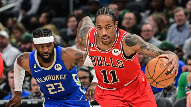 November 23, 2022; Chicago Bulls forward DeMar DeRozan drives to the basket against Milwaukee Bucks guard Wesley Matthews