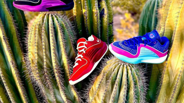 Three colorways of the Nike KD 16 on a cactus.
