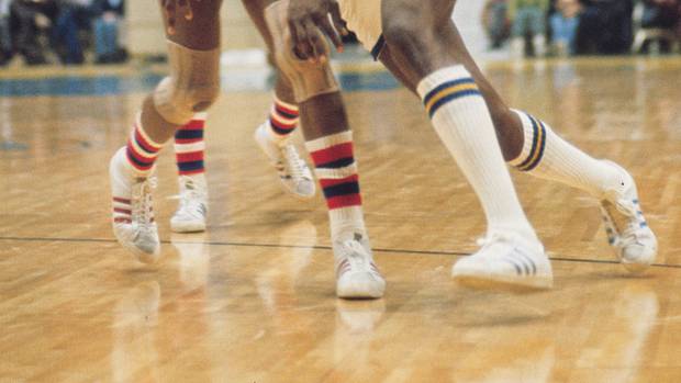Indiana Pacers forward George McGinnis (30) against the New York Nets during an ABA game.