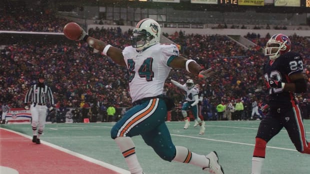Miami Dolphins running back Ricky Williams scores a touchdown against the Buffalo Bills.