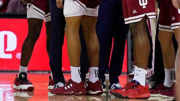 Indiana Hoosiers guard CJ Gunn (11) speaks with a coach as he is ejected for a flagrant 2 foul on Wisconsin Badgers guard Max Klesmit (11) during the second half of their game on Friday January 19, 2024 at the Kohl Center in Madison, Wis.