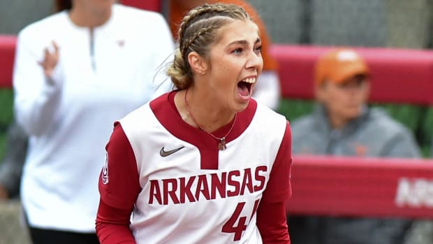 Razorbacks' first baseman Danielle Gibson reacts on a strikeout against Texas in the NCAA Super Regional. Gibson is now an assistant coach for Arkansas.
