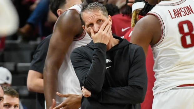 Eric Musselman looks on in frustration as his team struggles with South Carolina.