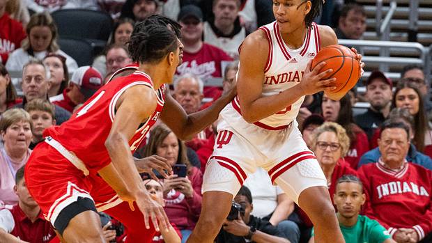 Indiana Hoosiers forward Malik Reneau (5) dribbles the ball while Miami (Oh) Redhawks guard Bryson Tatum (4) defends in the first half at Gainbridge Fieldhouse.
