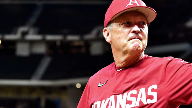 Arkansas head coach Dave Van Horn shows his displeasure against Oklahoma State at Globe Life Field in Arlington, Texas.