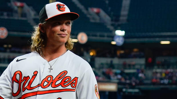 Jul 27, 2022; Baltimore, Maryland, USA; Baltimore Orioles number one draft pick Jackson Holliday waves to the crowd while being introduced during third inning of the game against the Tampa Bay Rays at Oriole Park at Camden Yards.
